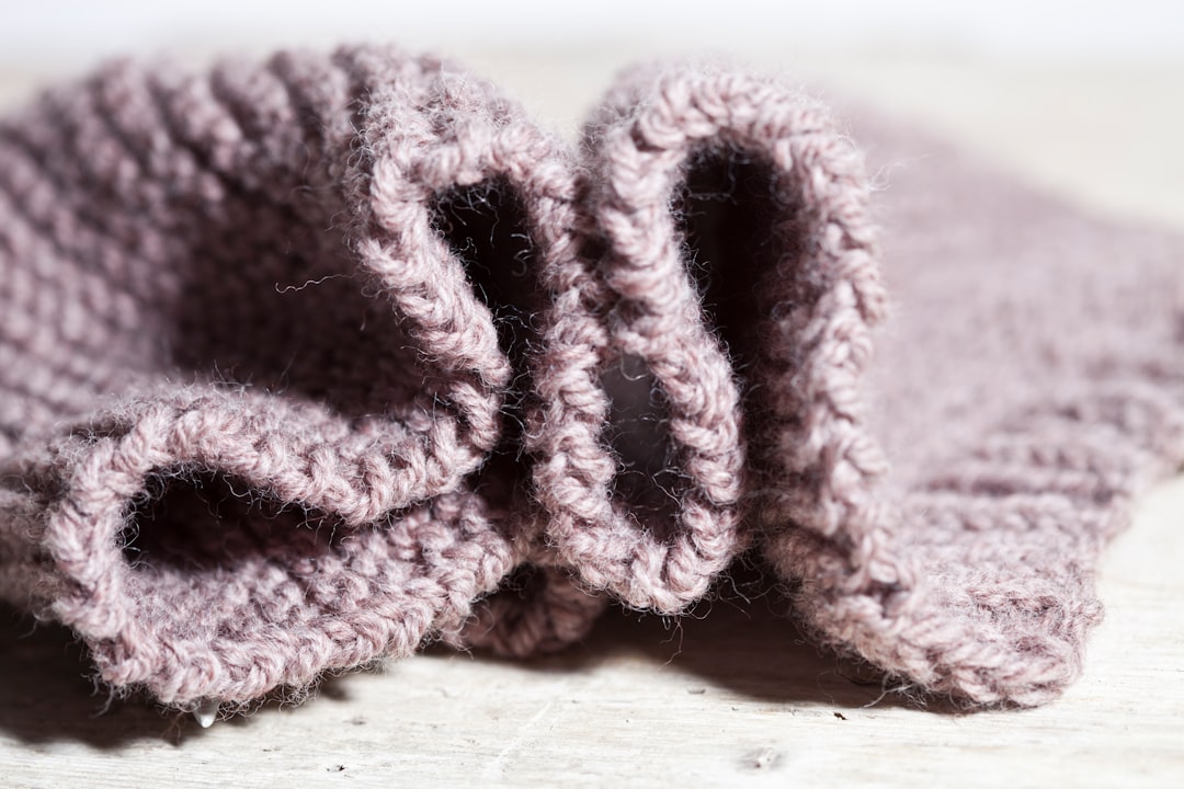 A close up of a knitted object on a table