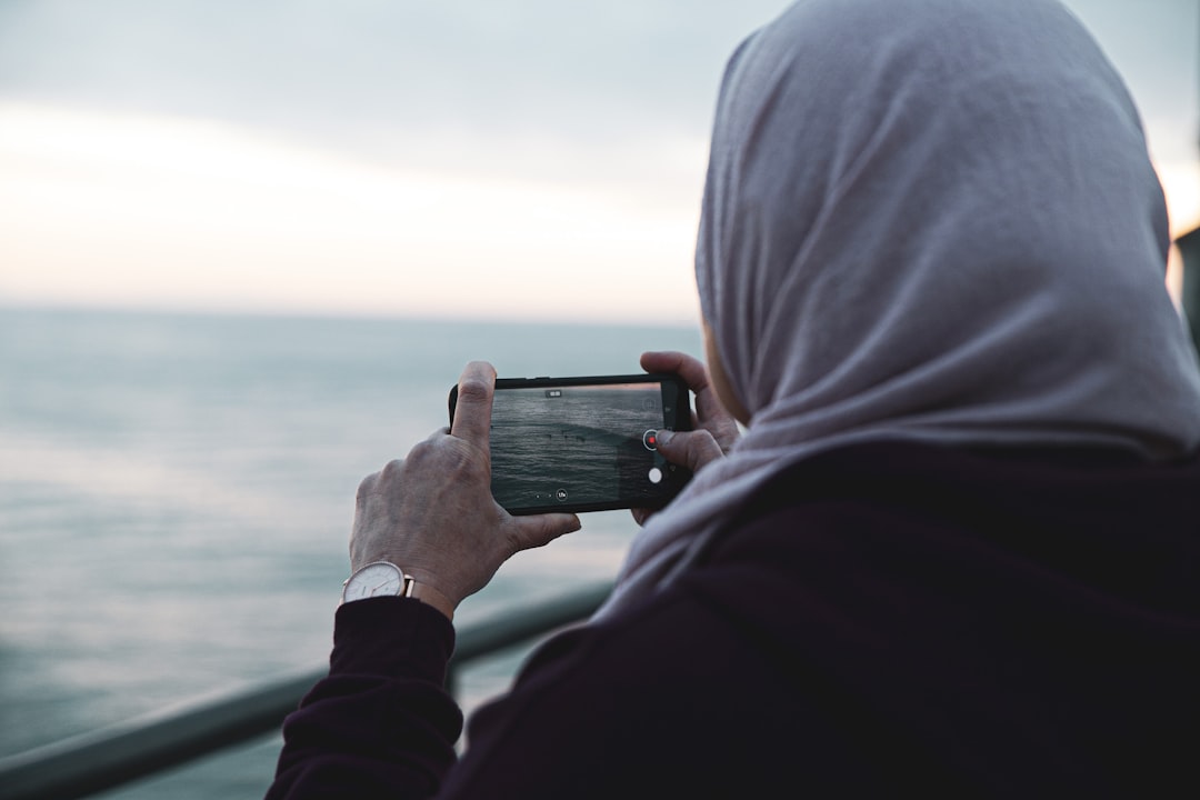 woman holding smartphone